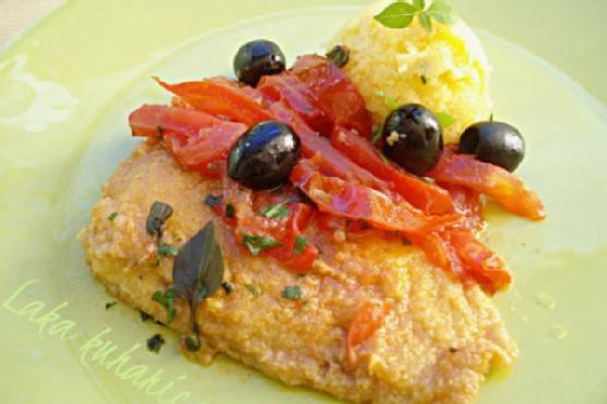 Cod with tomatoes, olives and polenta