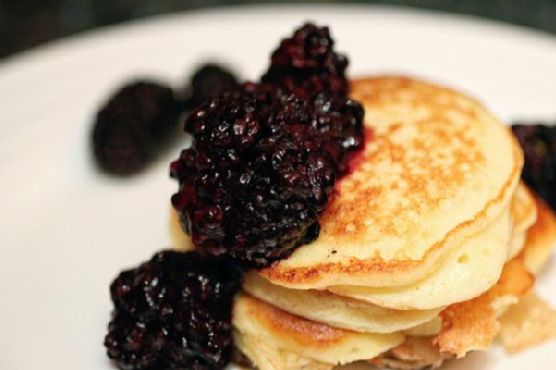 Meyer lemon ricotta pancakes with blackberry compote