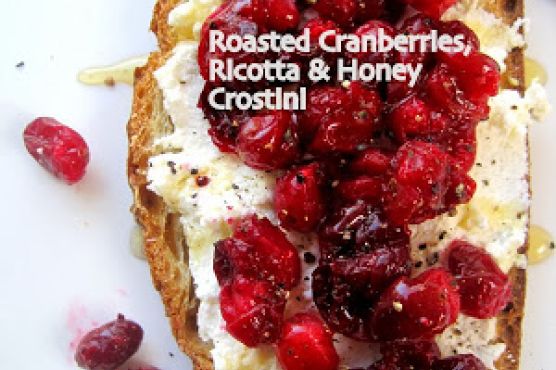 Roasted cranberry ricotta crostini