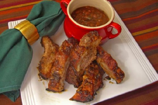 Barbecued baby back pork ribs with bush's grillin' beans