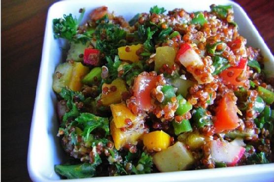 Colorful red quinoa tabbouleh salad