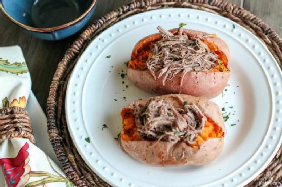 Shredded roast beef stuffed sweet potatoes