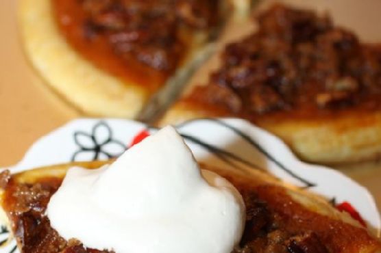 Pecan pumpkin pie dessert pizza with maple whipped cream