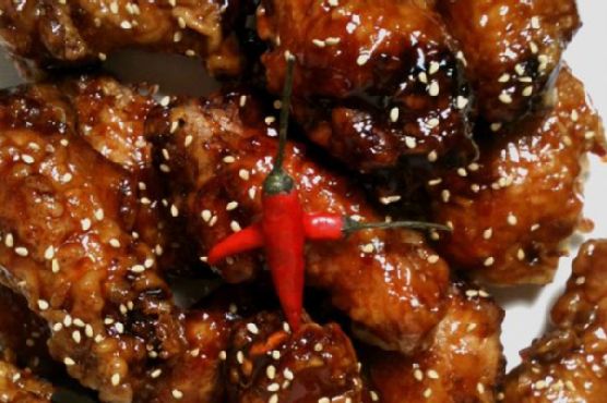 Korean extra crispy fried chicken with sweet spicy glaze