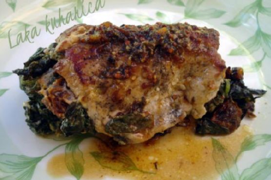 Tomato spinach stuffed pork chops