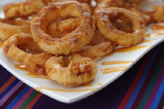 Dessert apple rings with cinnamon cream syrup