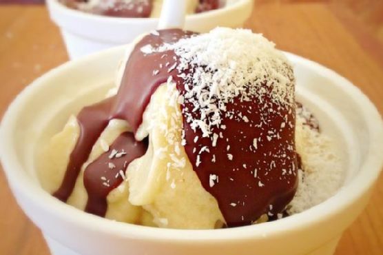 Ultimate frozen coconut ice cream with hard shell chocolate sauce