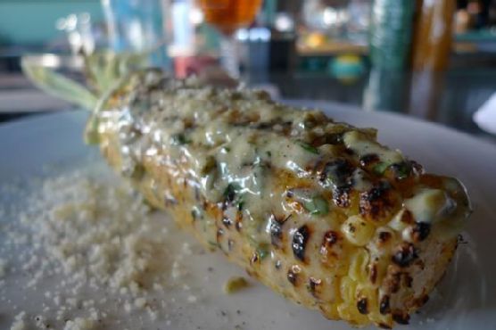 Barbecued corn on the cob with spiced butter