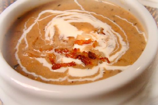 Golden cream of mushroom soup with crispy shallots & creme fraiche