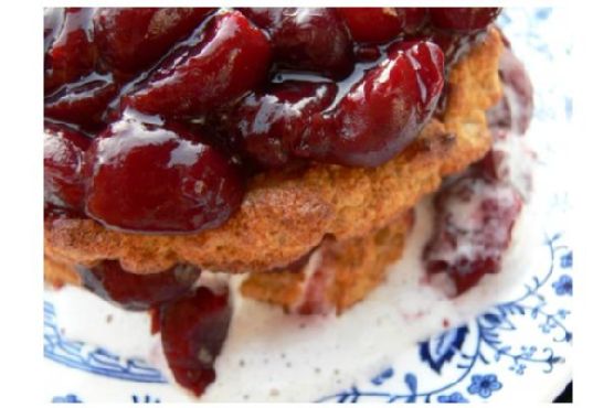 Almond torte with cream & cherries