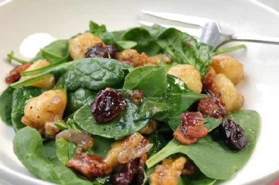 Gnocchi and wilted spinach salad