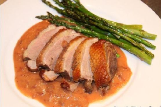 Duck with dried cranberries and mascarpone sauce