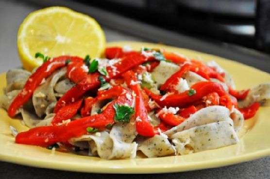 Basil tagliatelle with roasted red bell pepper salad