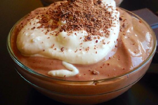 Creamy chocolate pudding with coconut whipped cream