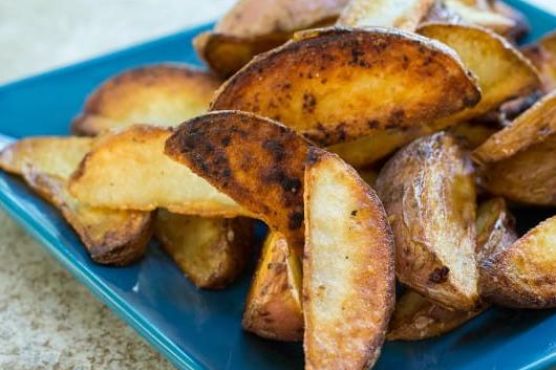 Pan fried potato wedges