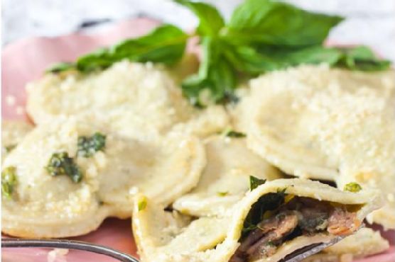 Prosciutto and mushroom ravioli with basil browned butter sauce