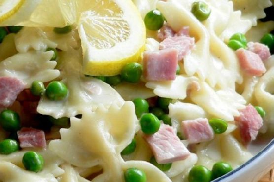 Ham and peas farfalle in creamy lemon parmesan sauce